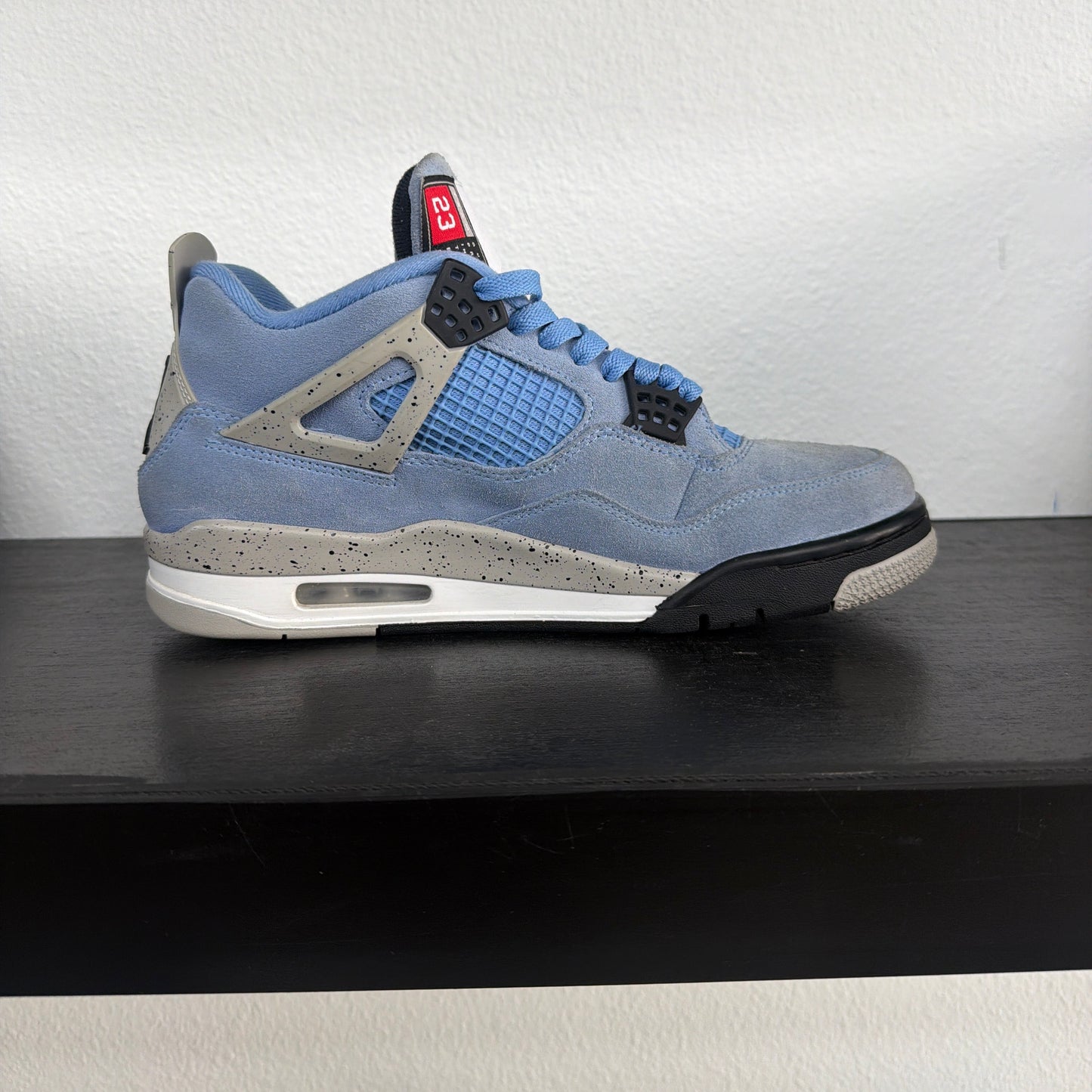 Preowned Jordan 4 Retro University Blue